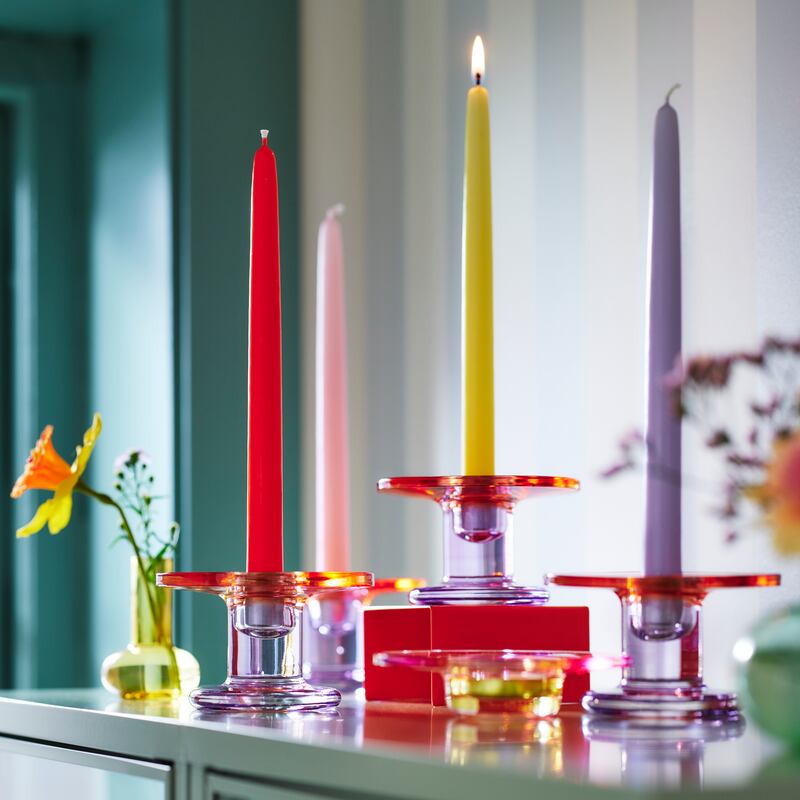 Fill shelving within interesting glass objects. The seven cm high Tjarlek candlestick, €8, from Ikea